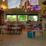 A room filled with lots of tables and chairs.